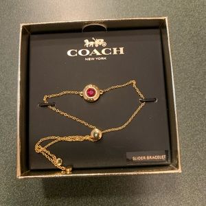 Coach slider bracelet red/gold